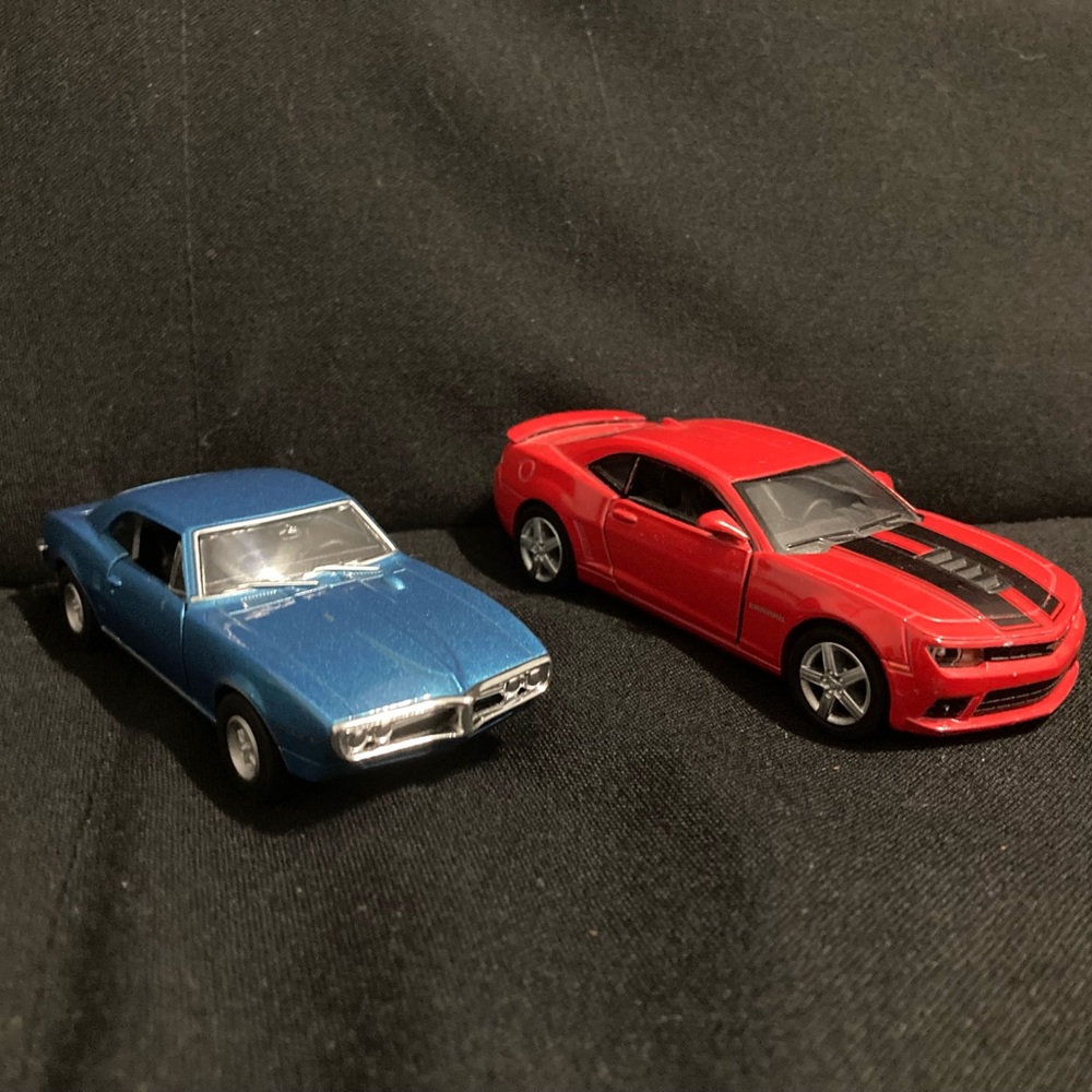 Blue older firebird + New red camero
